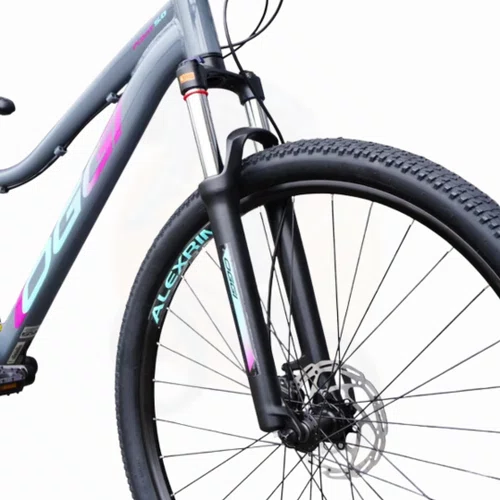 Bicicleta Oggi Aro 29 Float 5.0 HDS 1X8 Essa Grafite/Rosa/Azul T17 2026