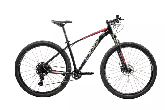 Bicicleta 29 Oggi Big Wheel 7.0 2026 Cues 9v Preto/Vermelho Tamanho 19