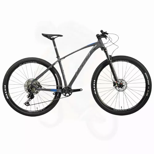 Bicicleta Aro 29 Oggi Big Wheel 7.2 1X12 Deore Graf/Azul/Cinza T19 2026